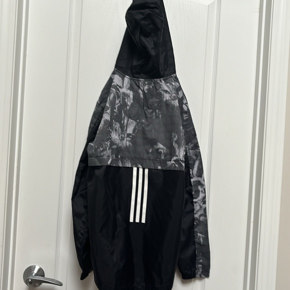 Adidas light rain coat with a zip up front and hood - Picture 4 of 4